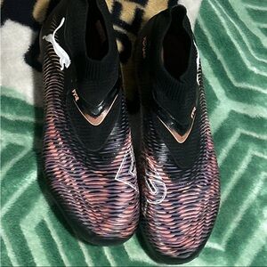 Puma Black and Pink Athletic Cleats